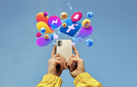 hands-holding-smartphone-social-media-concept-scaled-1200×675